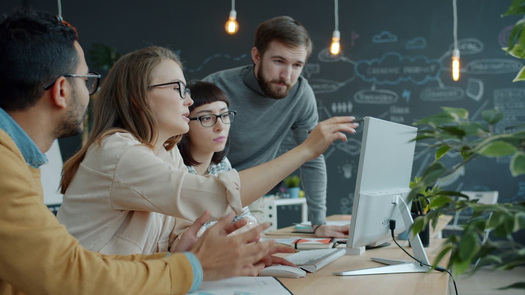 Team collaborating in a hands-on AI training session